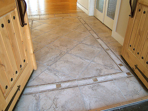 Tile design floor in entry, double entry door...