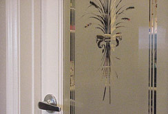 Large pantry features etched glass door