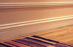 Additional wood trim in the hallway, hardwood...