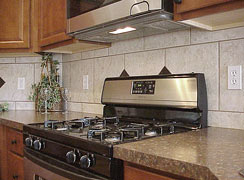 Stainless gas stove,... also, stainless steel dishwasher, microwave oven