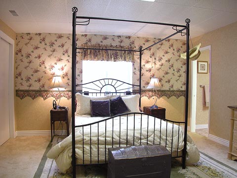 Master suite features his & hers closets, pocket door to the master bath, all new and ready for new owner...