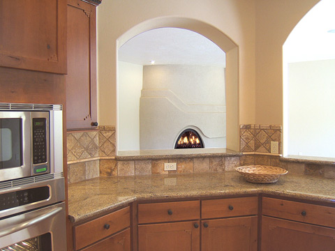 Arches frame the kitchen...