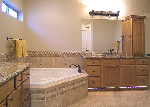 Large room features separated vanities, large walk-in closet, walk-in shower, iron accessories... 