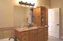 Shows separate vanity with medicine cabinet, deep drawers & cabinet space...