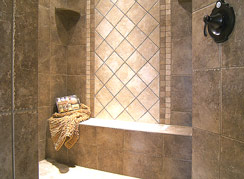 All tiled oversized walk-in shower features bright lights and two nozzles... 