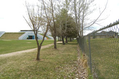 Fencing separates the school grounds and Bridgeport Subdivision...